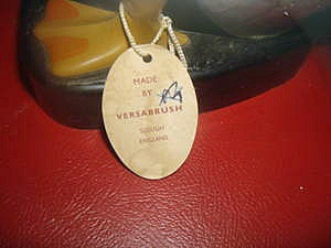 The back of the sales tag,reading ;Made by Versabrush'. 